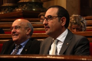Els consellers d'Interior i Salut, Ramon Espadaler i Boi Ruiz, durant el ple del Parlament.
